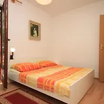 7023a